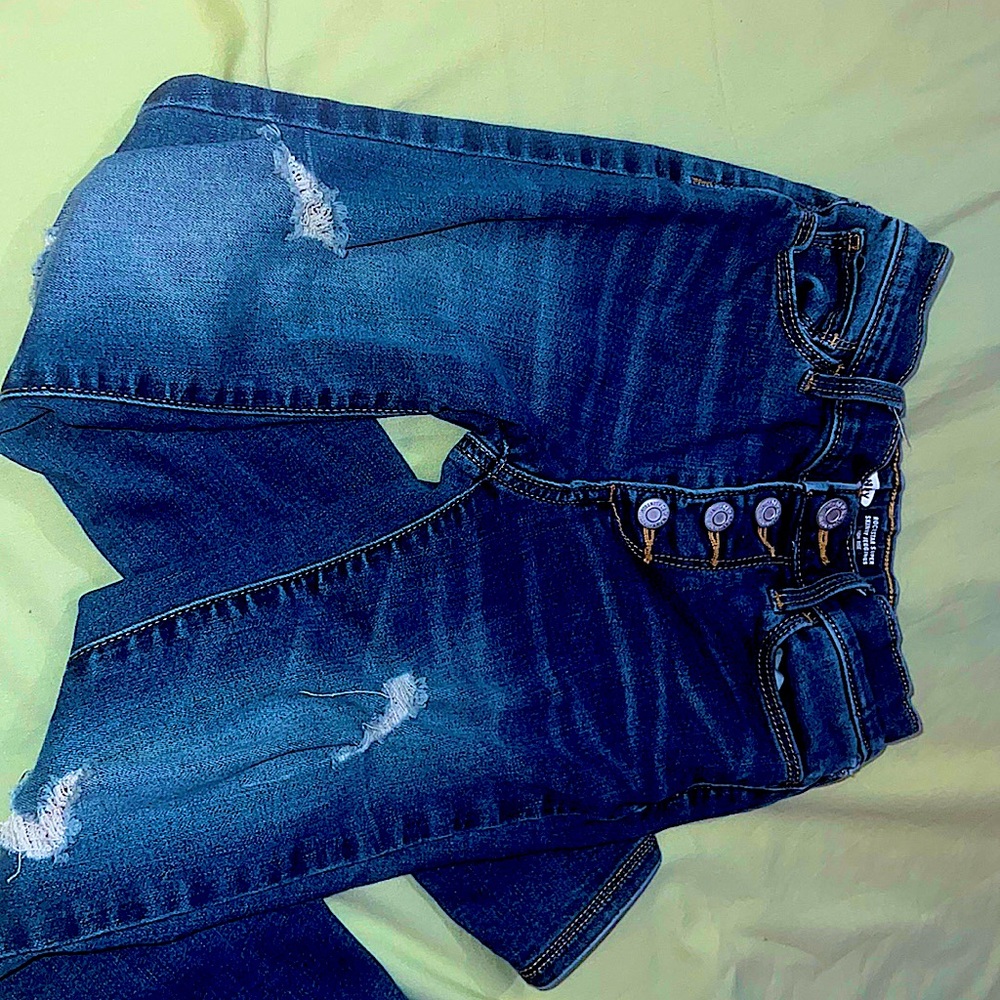 Skinny legged ripped jeans